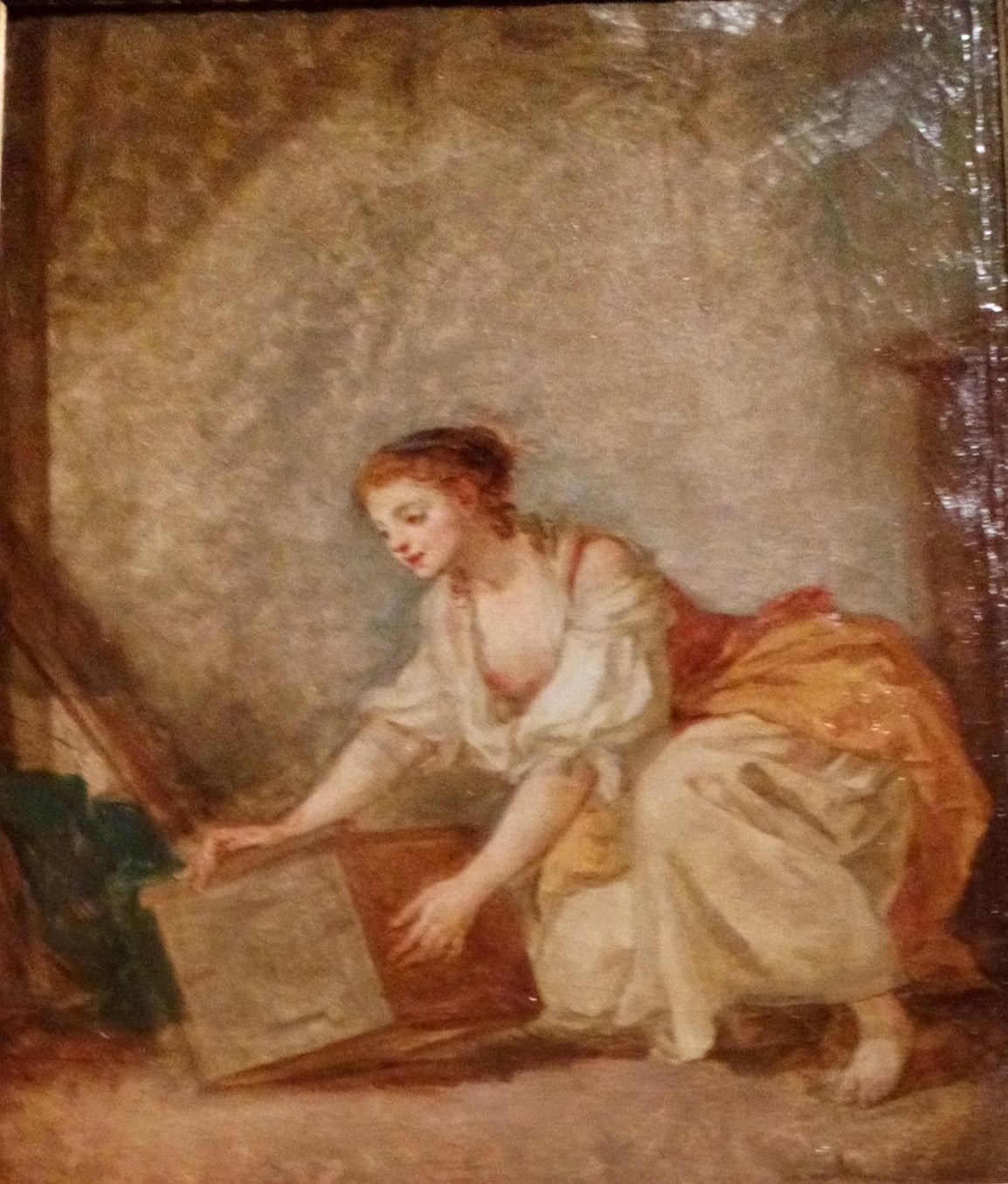 Jeune femme soulevant un coffret - Jean-Baptiste Greuze