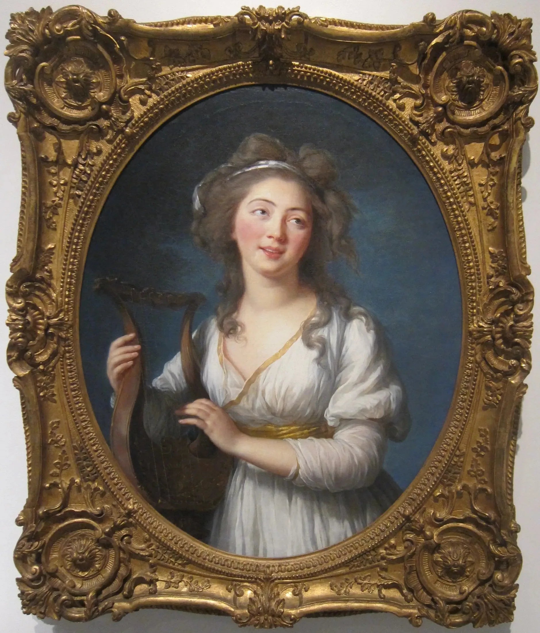 Portrait d'une jeune femme jouant de la lyre - Élisabeth Vigée Le Brun image 1 tableau peint à l’huile sur toile